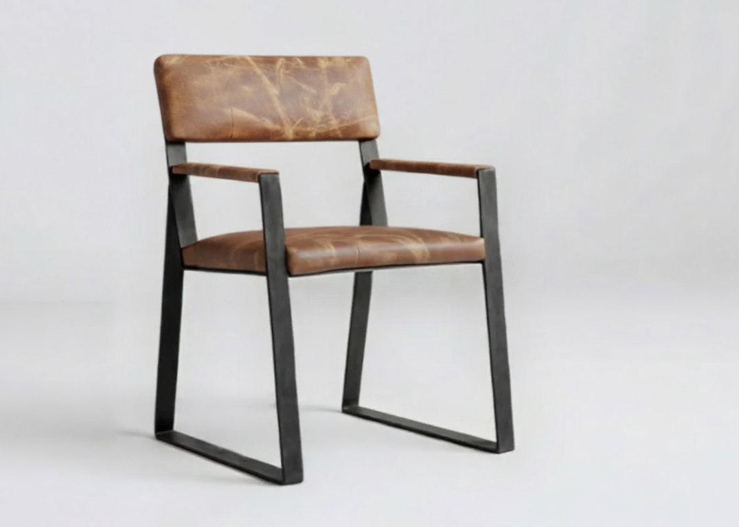 Chair with brown leather seat and black metal frame on a white background