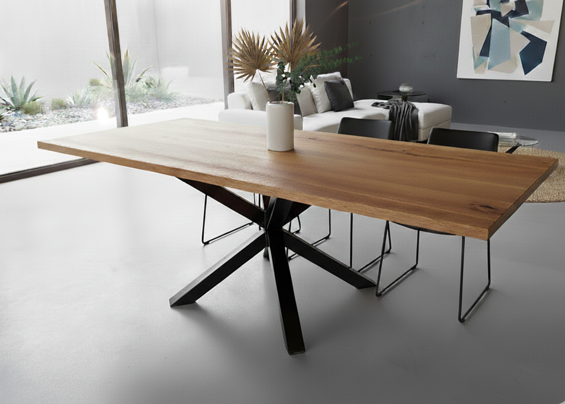 Modern wooden dining table with black metal legs in a minimalistic living room setting.