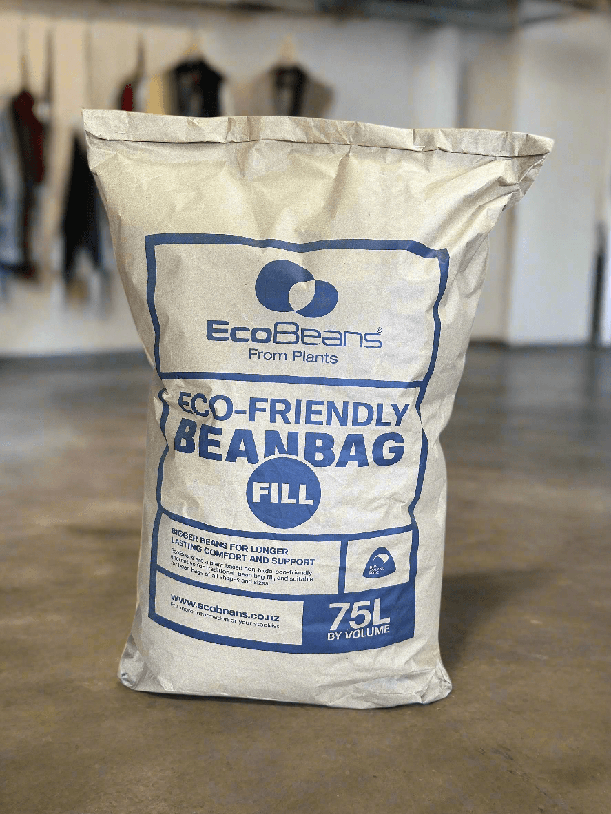 White bag labelled EcoBeans beanbag fill standing on a floor