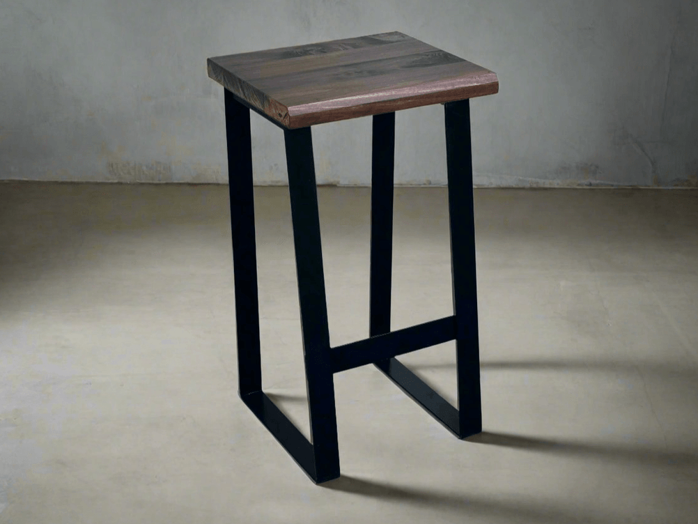 Square brown stool seat with black rectangular frame legs