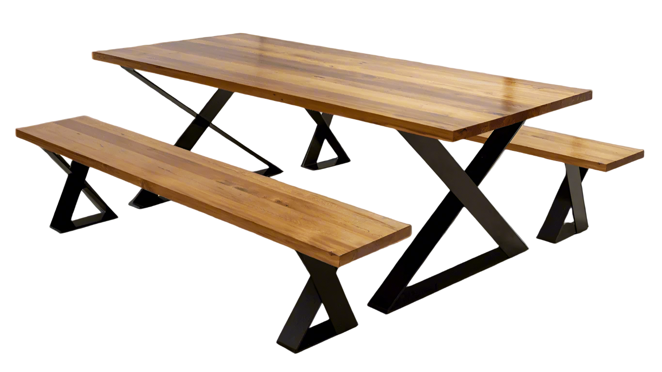 A large dining table featuring crossed X-shaped leg frames at each end and a thick wooden top, creating a modern architectural look in a spacious dining room.