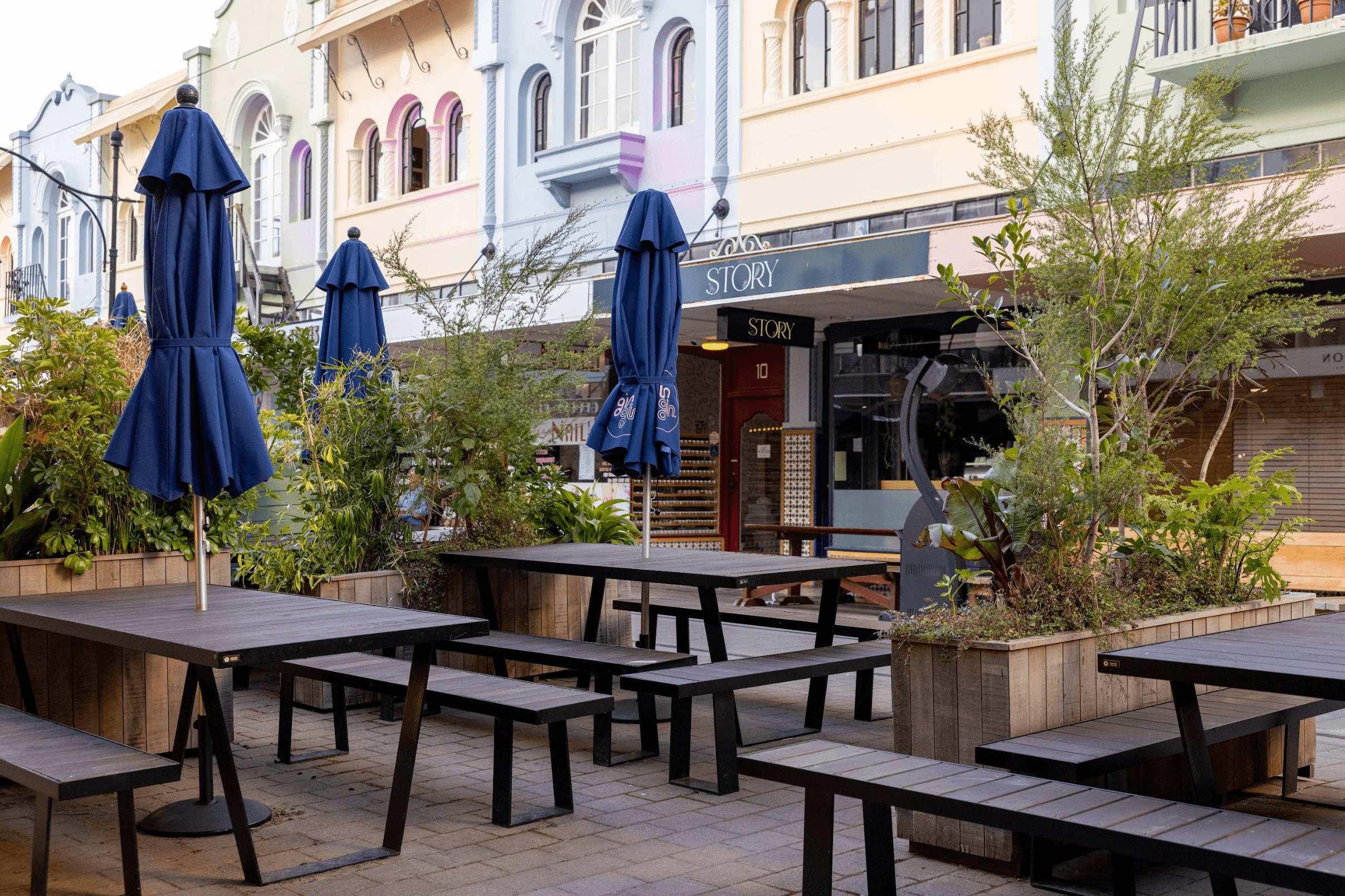 Detail view of a hardwood outdoor dining table by Innate Furniture