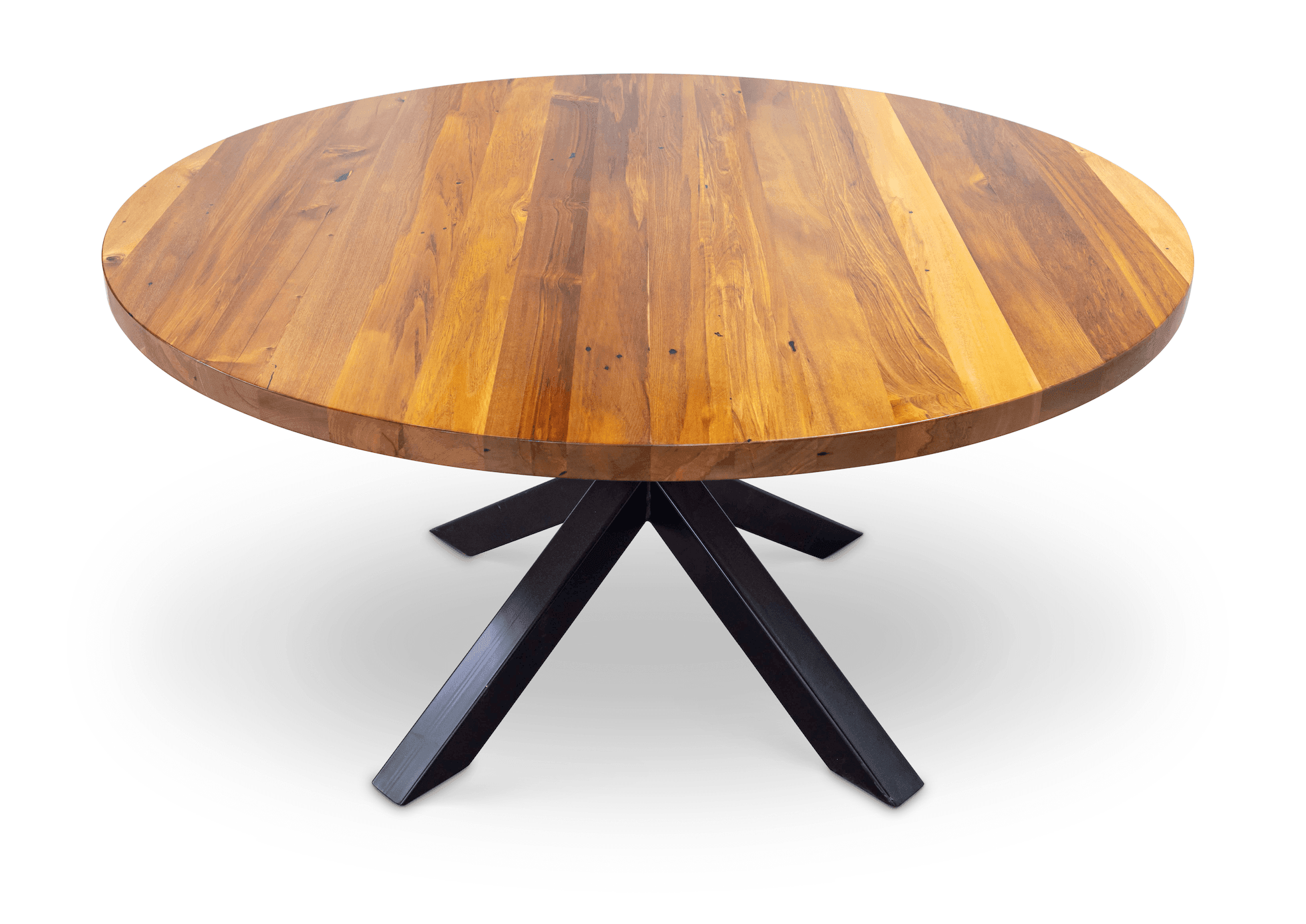 Round Asterix dining table in honey-toned solid NZ native timber on asterisk-shaped powder-coated steel base