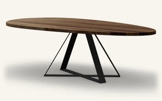 Render of a pebble Rimu dining table, Walnut finish, on the Crossroads base in Black steel