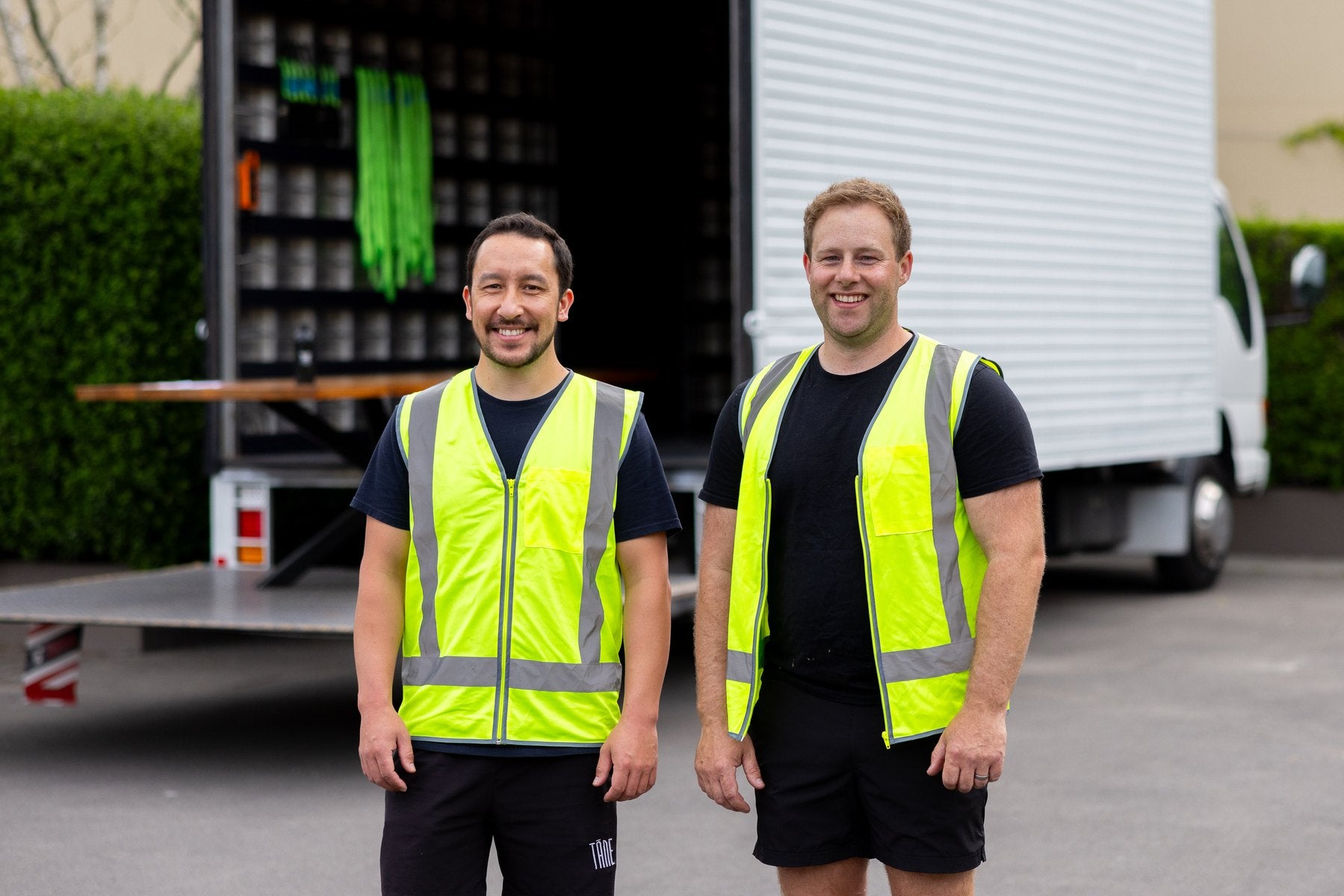 Pinpoint delivery team beside the truck for an Innate furniture delivery