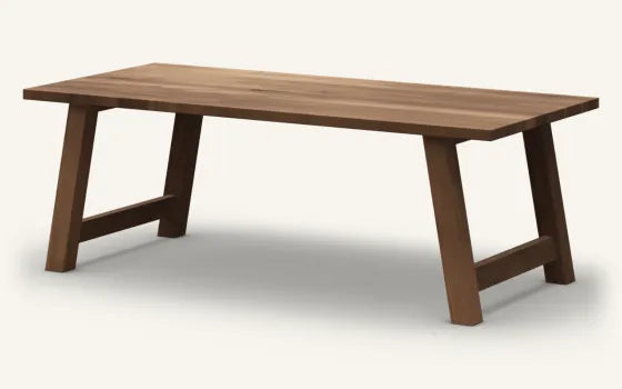 Render of a rectangular Beech dining table, Walnut finish, on the Modern Homestead base in solid timber