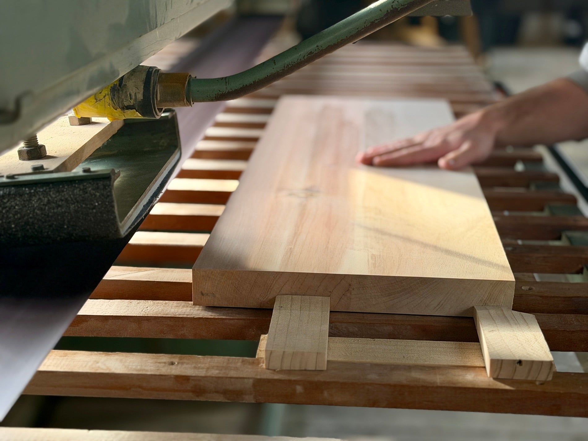 Solid timber being machined in the Innate Furniture Christchurch workshop.